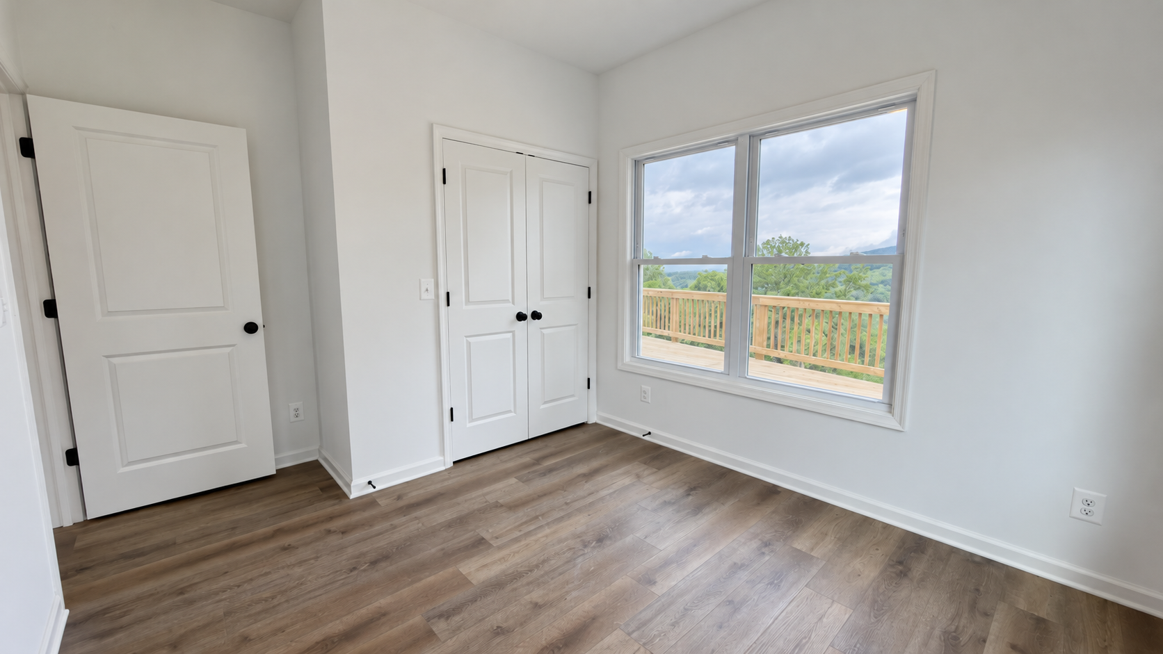 Grace Chalet bedroom with closet and deck view